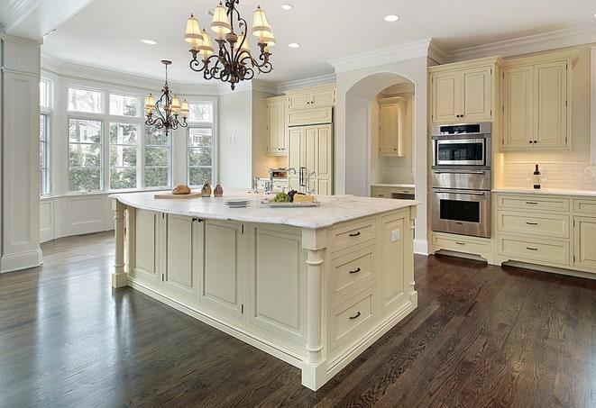 newly installed grey laminate floors in modern kitchen in Eden GA